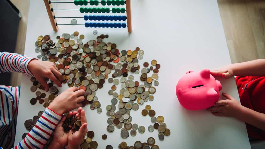 Counting money from piggy bank