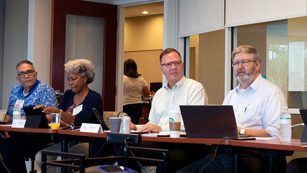 Rev. Mark Becker at board meeting