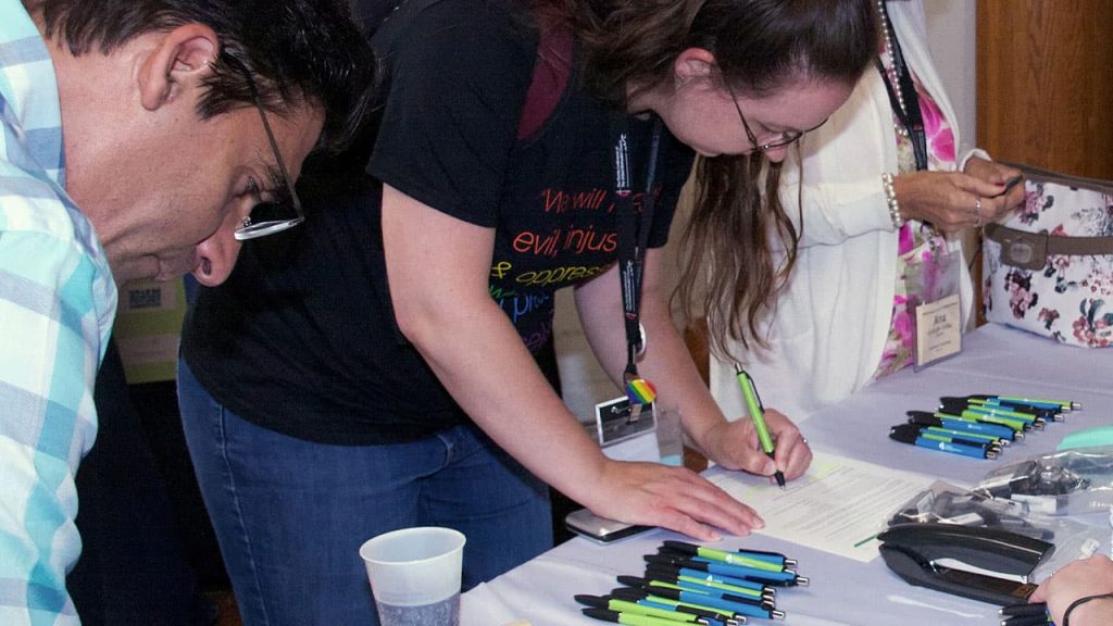 Staff help people open development fund