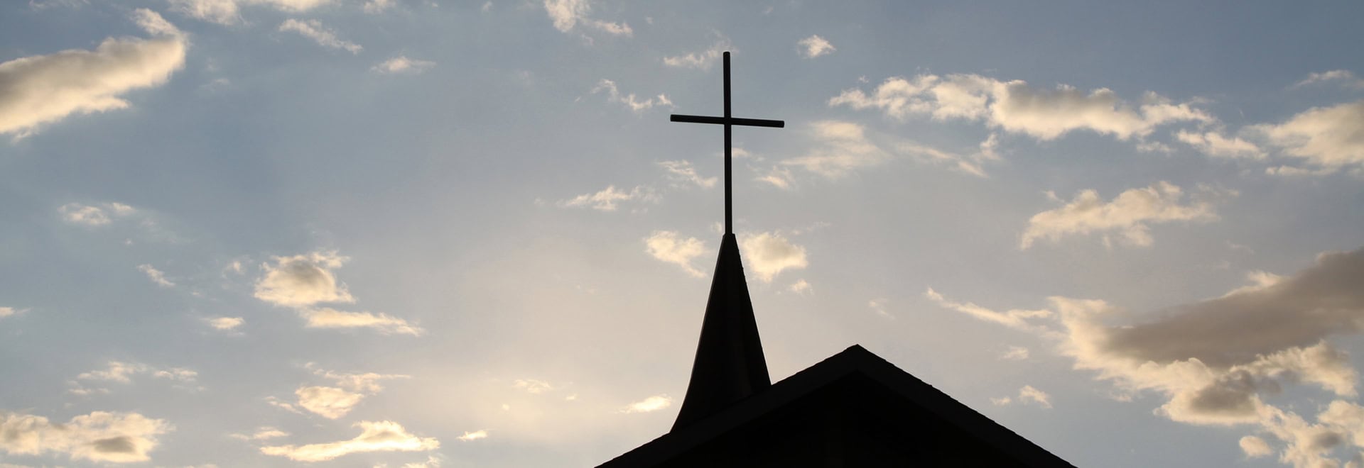 church silhouetted at dusk